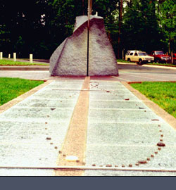 1989, granite and stainless steel, 12'h x 40'l x 30'w 