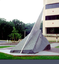 1989, granite and stainless steel, 12'h x 40'l x 30'w 