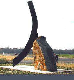 black granite and painted steel,16'h (view south-before landscaping)