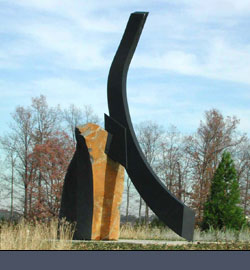 Updraft, black granite and painted steel,16’h 